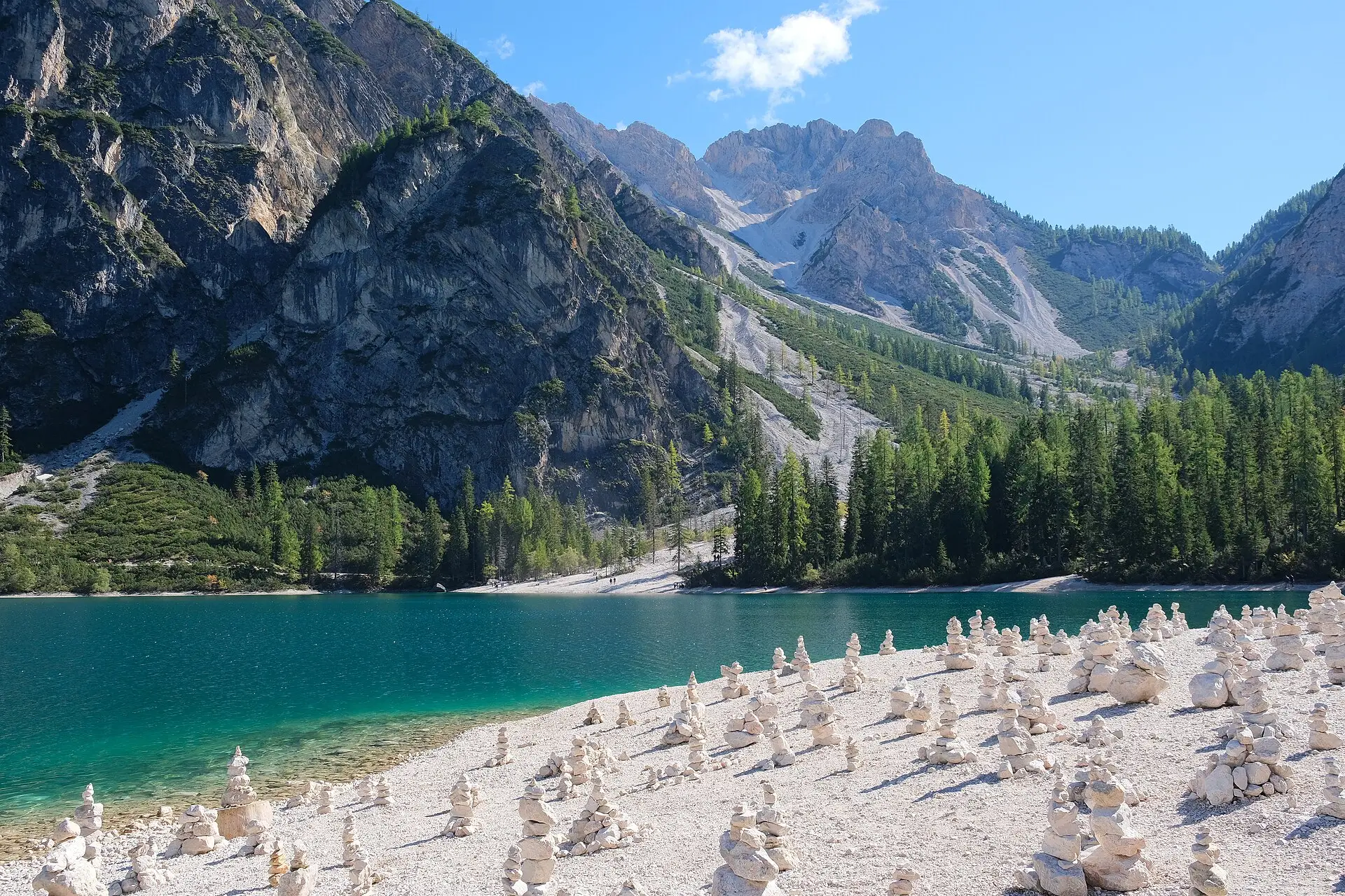 Lago di Braies (Pragser Wildsee) — the emerald glacial lake with karst dolomite peaks behind.