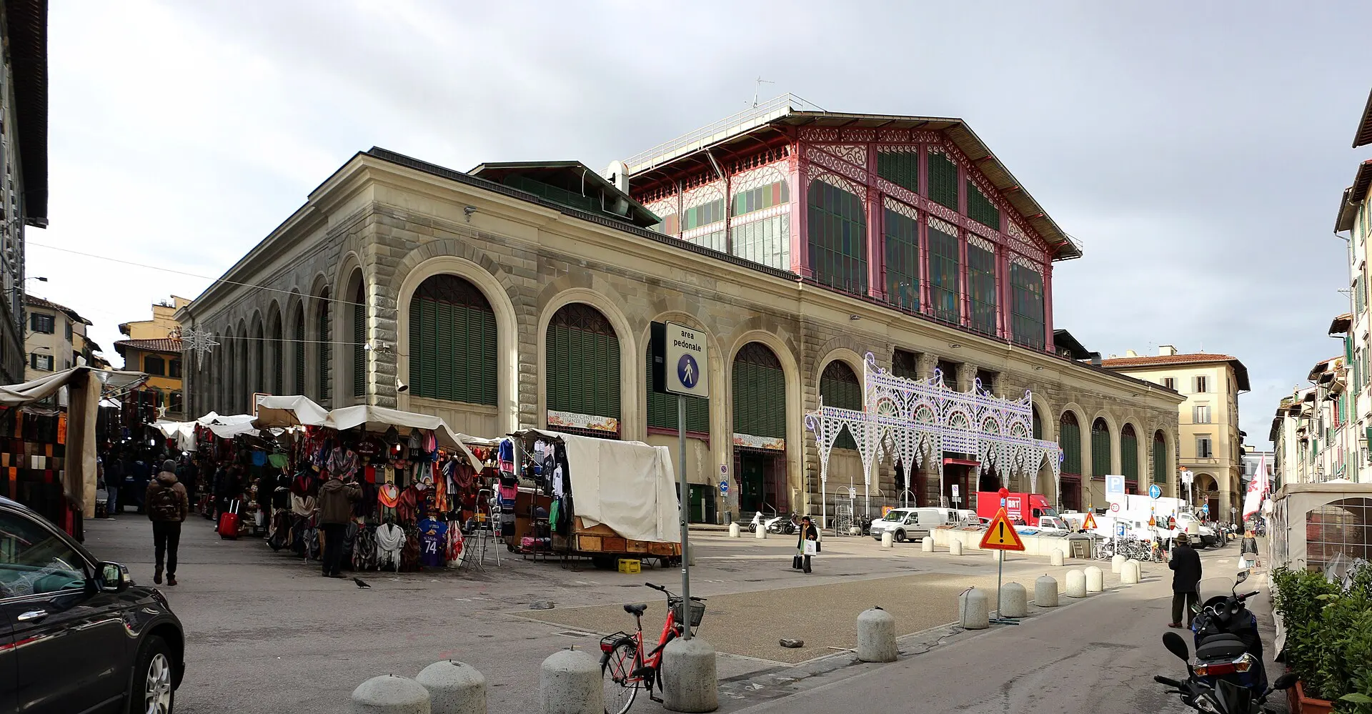 Mercato Centrale in San Lorenzo, Florence — the 19th-century iron-and-glass market hall with arcades and stalls at the entrance.